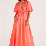 model wears a pink maxi dress