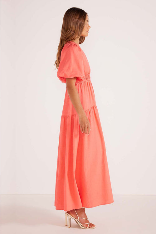 model wears a pink maxi dress