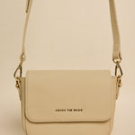 beige mini handbag