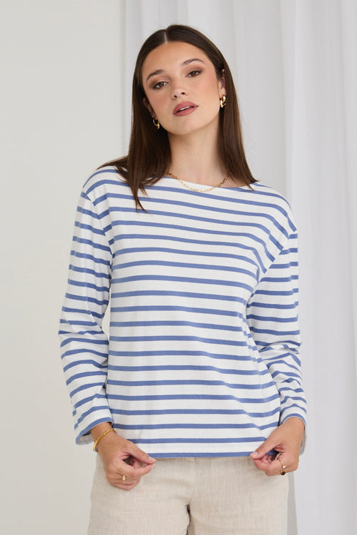 model wears blue and white stripe top
