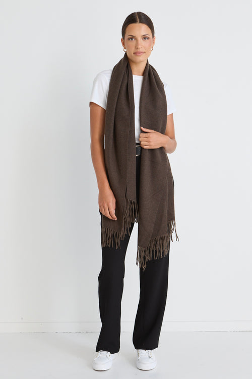 Model wears a brown scarf