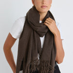 Model wears a brown scarf