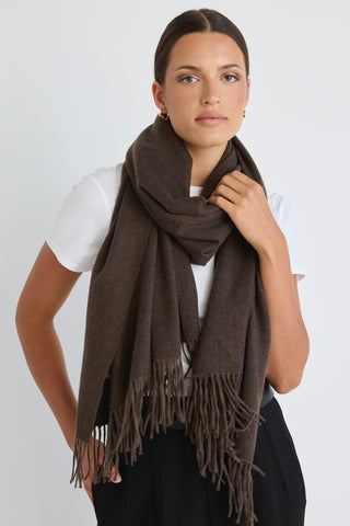 Model wears a brown scarf