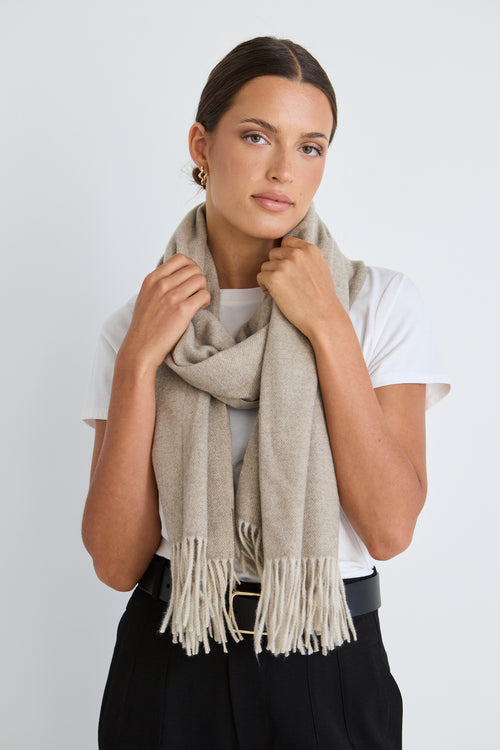 Model wears a moss scarf