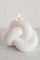 Infinity Knot Decorative White Unscented Candle