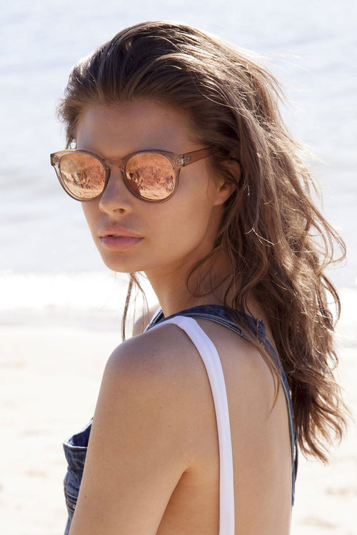 model wears Round Clear Tan Sunglasses